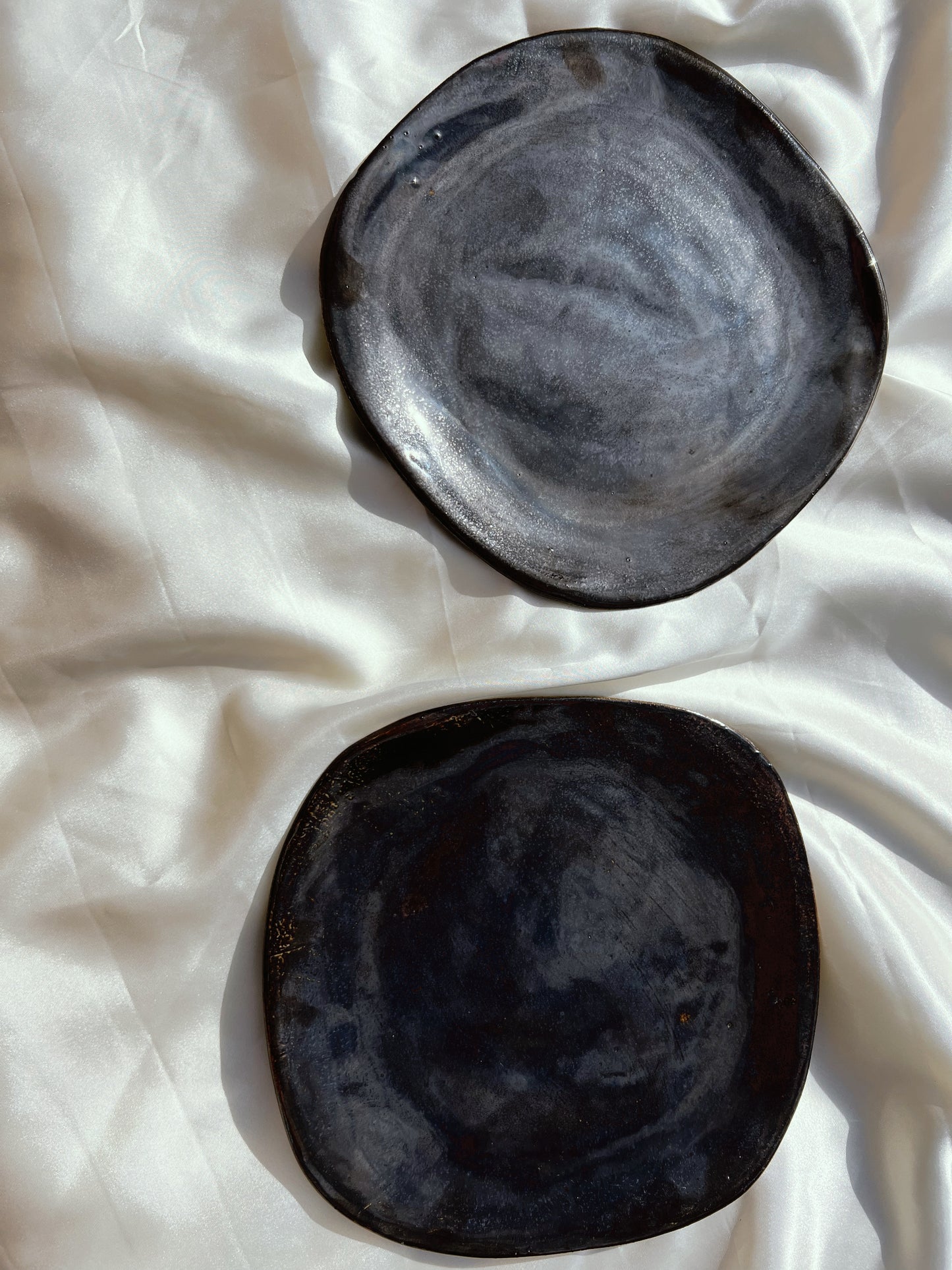 Two Ceramic Plates — Cosmic Black Ice