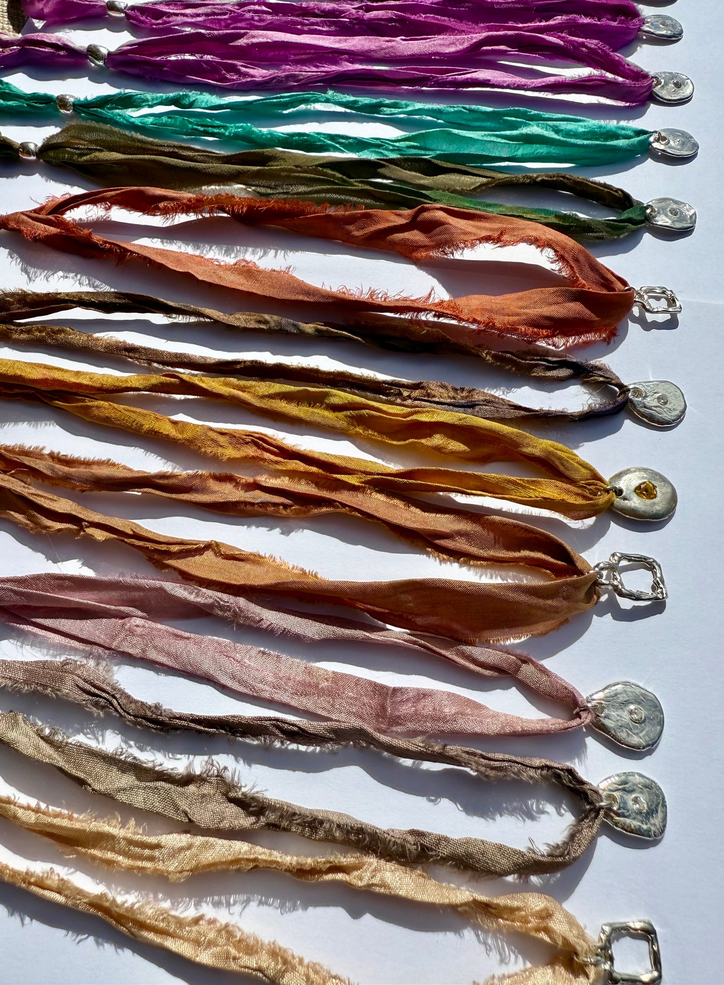 Sunworn Silk Ribbons — Silver