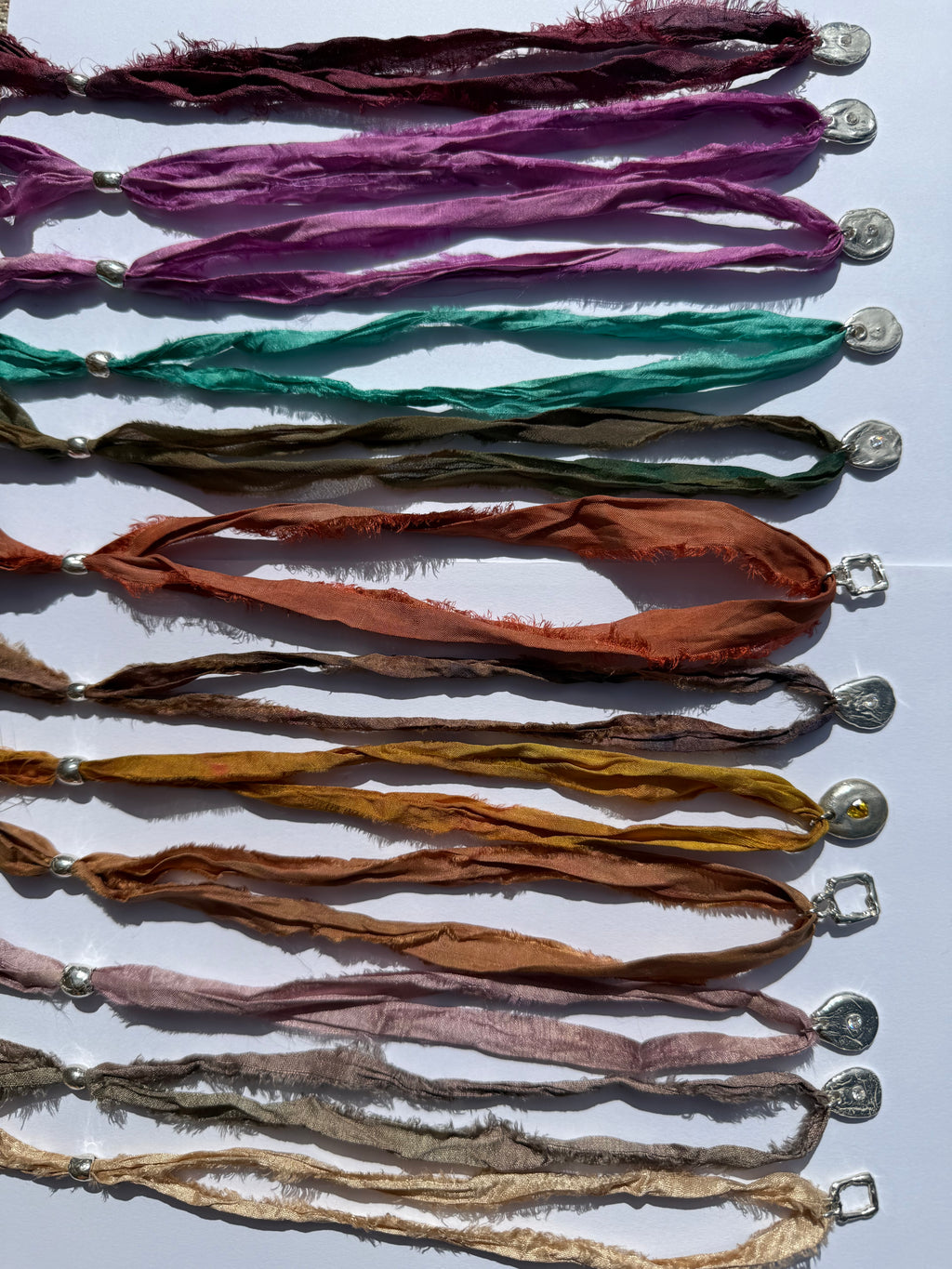 Sunworn Silk Ribbons — Silver